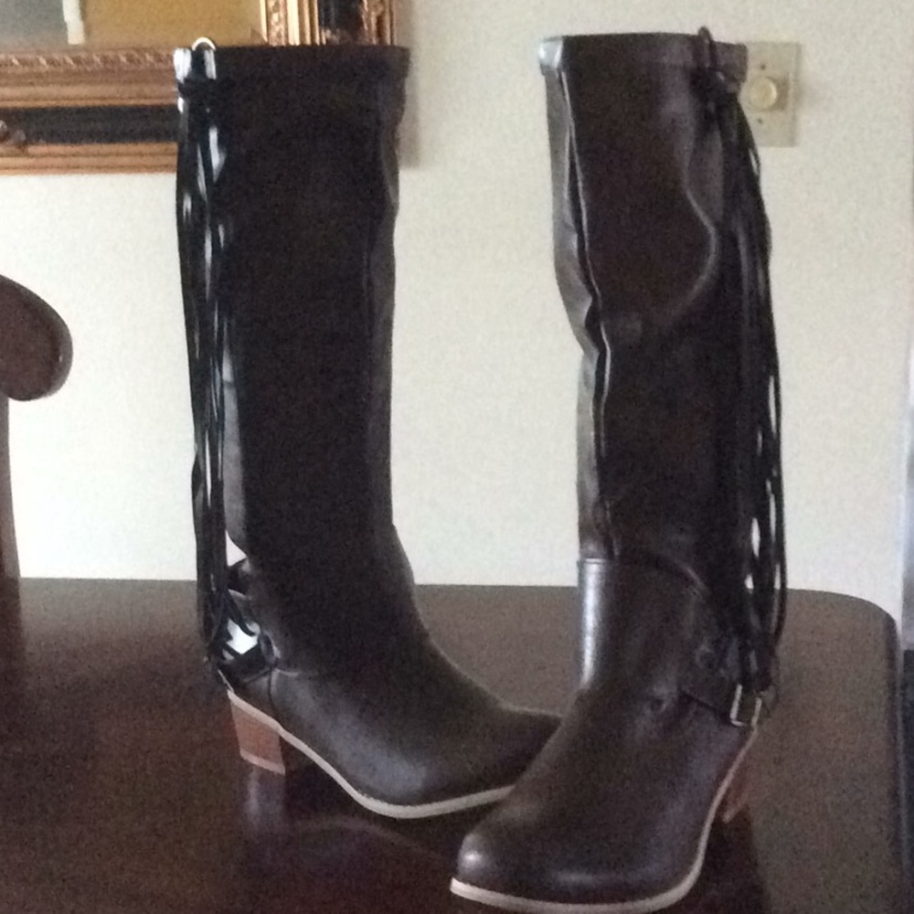 Brand new , never worn pleather boots.
